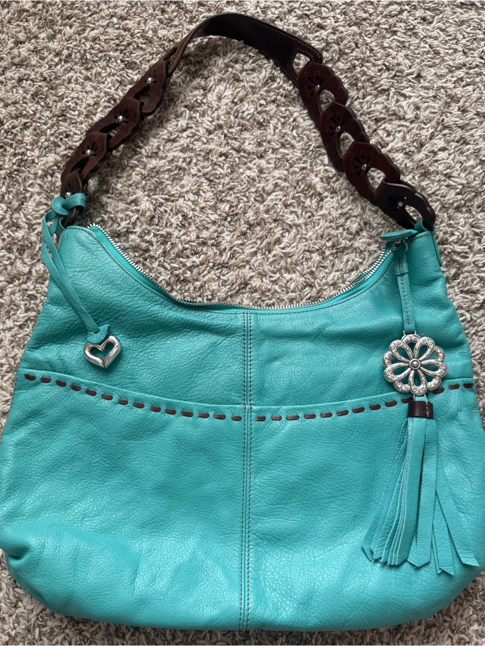 Brighton Kodiak Shoulder Bag
Women Turquoise Leather Tassel
Floral Charm